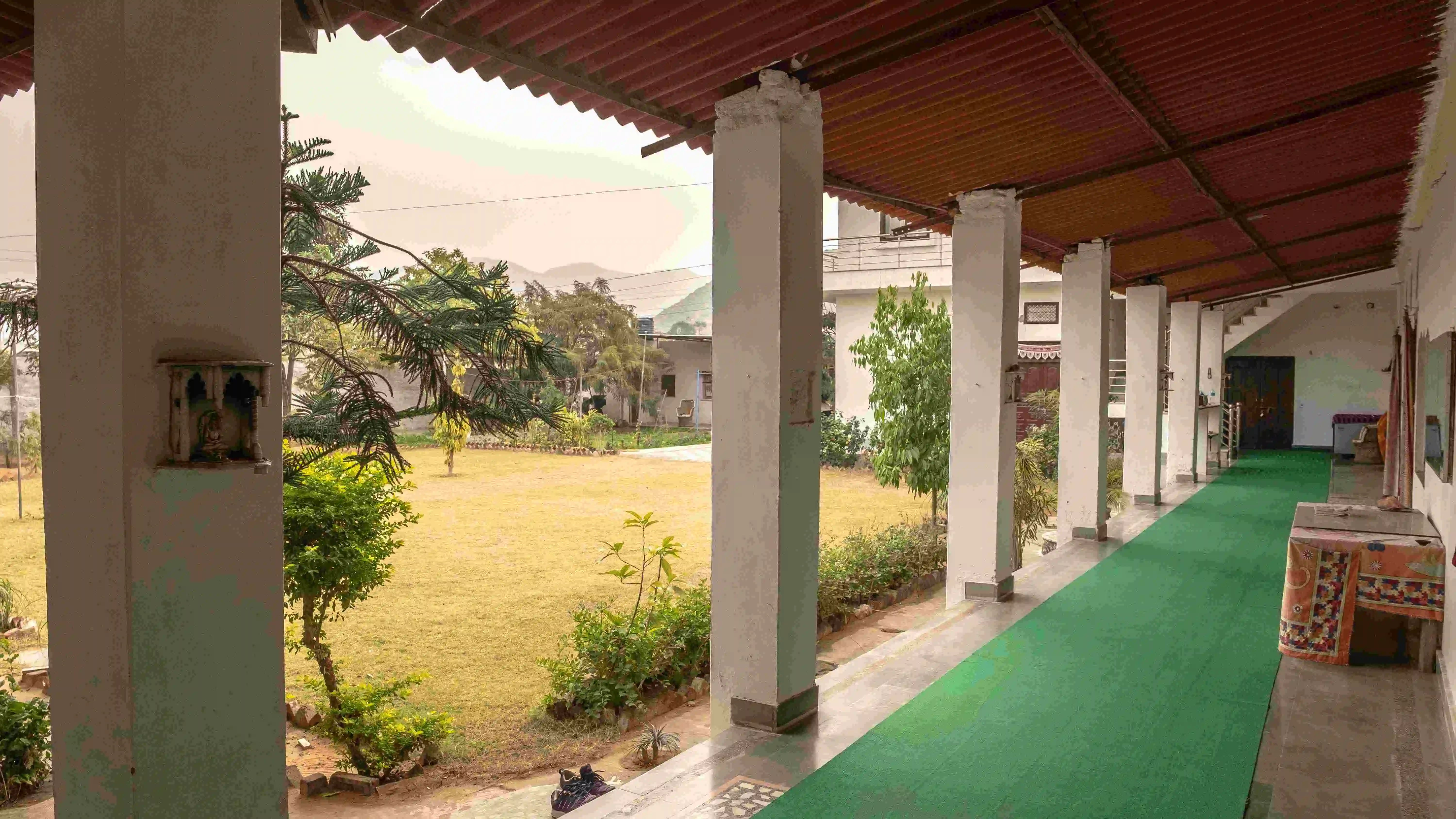 Pushkar Yoga serene ashram garden view for short Stay.